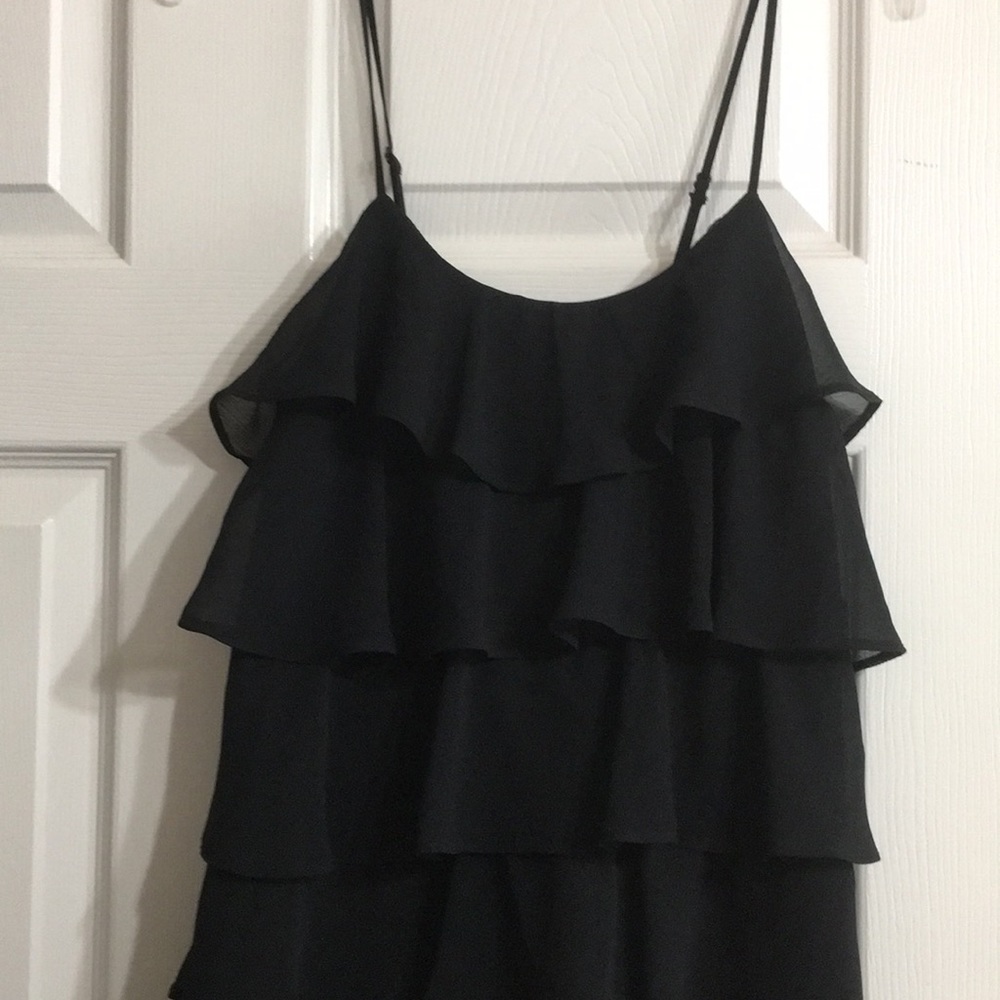 Spaghetti strap blouse with ruffles